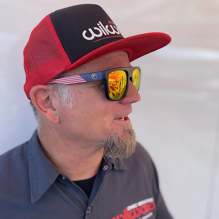 Mike Hammrick wearing Heatwave sunglasses and a Wilwood Disc Brakes foam flat bill cap